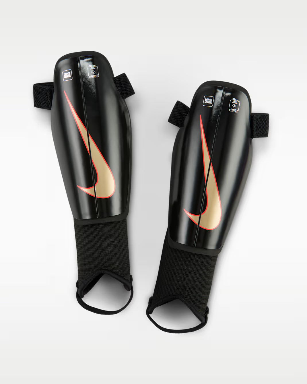 Nike Charge Youth Soccer Shin Guards Black/Bright Crimson/Blur product image 1, provided for visual reference and product
